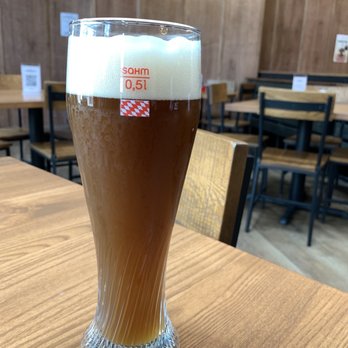 Kusterer Brauhaus - Here's an example of how they miss the literal mark on a freshly poured beer. - Beer Bar Near Me - Grand Rapids, Michigan