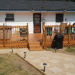 Timmons Home Rehab and Repairs - 16x24 treated deck and stained and landscape