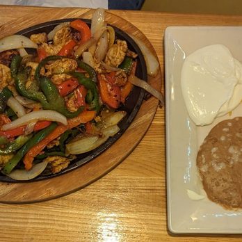 Plaza Azteca - a plate of mexican food and a plate of rice - New Mexican Cuisine Near Me - Altoona, Pennsylvania Plaza Azteca - a plate of mexican food and a plate of rice - New Mexican Cuisine Near Me - Altoona, Pennsylvania