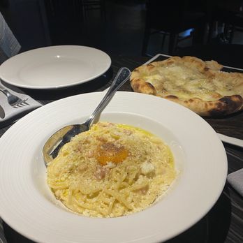 Plate - Carbonara and Quattro Formaggi Pizza - Cocktail Bars Near Me - Kansas City, Missouri Plate - Carbonara and Quattro Formaggi Pizza - Cocktail Bars Near Me - Kansas City, Missouri