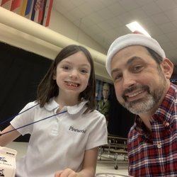 Pinewood Preparatory School - Me and my dad at lunchtime sitting together in the lunchroom when he was doing the gingerbread house