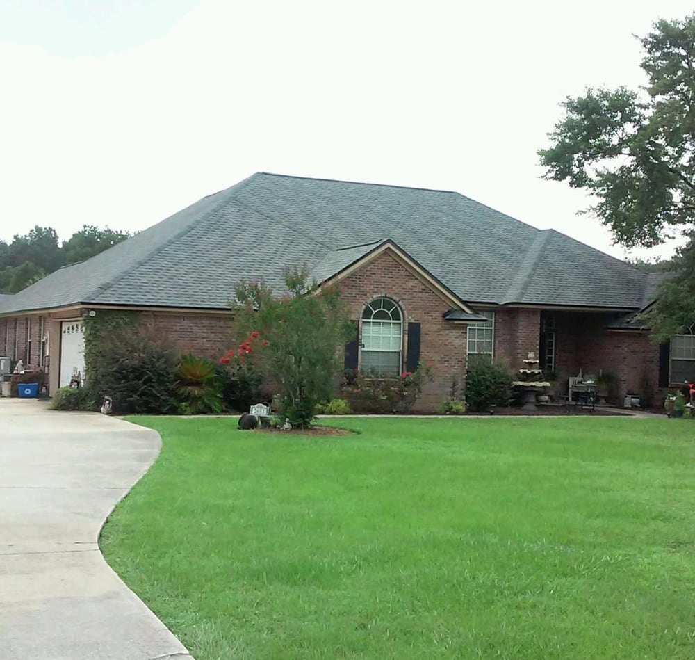 Slide of J&M Roofing Services