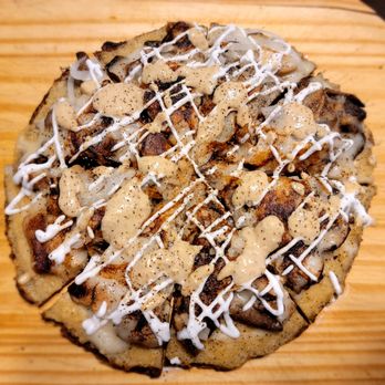 Haven Market - a homemade pizza on a cutting board - Vegan Near Me - Livingston Manor, New York Haven Market - a homemade pizza on a cutting board - Vegan Near Me - Livingston Manor, New York