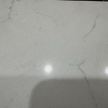 SD Kitchen Cabinets - Yellow stains next to the kitchen faucet - Cabinetry Near Me - San Diego, California