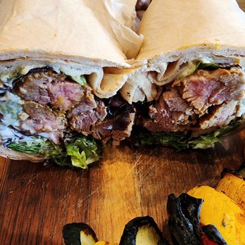 Sotta - Filet mignon wrap cut in half. - Mediterranean Near Me - Burbank, California Sotta - Filet mignon wrap cut in half. - Mediterranean Near Me - Burbank, California