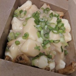 Diesel and Duke - Poutine fries come with gravy, cheese curds, and scallions