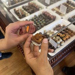 The Chocolate Shoppe - Beautiful variety of truffles as the checkout counter, what a cute checkout counter!!