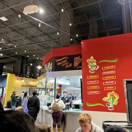 people eating at tables people eating at tables