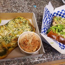Pesto/bacon/chicken on left Pesto/chicken/artichoke flatbread