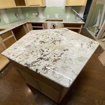 Texas Counter Fitters - New granite on our 5-sided kitchen island. - Building Supplies Near Me - Richardson, Texas Texas Counter Fitters - New granite on our 5-sided kitchen island. - Building Supplies Near Me - Richardson, Texas