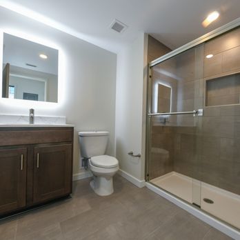 Bowery District - Tiled walk-in shower with glass door - Apartments Near Me - Akron, Ohio