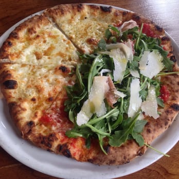 Mioposto - Quattro formaggio & prosciutto with arugula. - Italian Near Me - Seattle, Washington