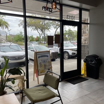 Bestea - Entrance area of Bestea cafe with thin green cushioned chairs accented black. - Bubble Tea Near Me - Oviedo, Florida Bestea - Entrance area of Bestea cafe with thin green cushioned chairs accented black. - Bubble Tea Near Me - Oviedo, Florida
