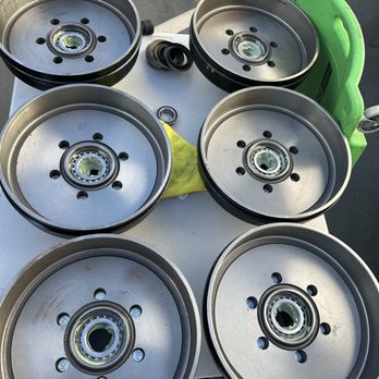 American Edge - Packing bearings & installing seals on new drum hubs for a triple axel Santek toy hauler. - Trailer Repair Near Me American Edge - Packing bearings & installing seals on new drum hubs for a triple axel Santek toy hauler. - Trailer Repair Near Me