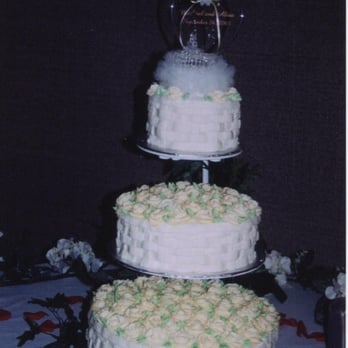 Have Your Cake - three tiered cakes on a table - Bakeries Near Me Have Your Cake - three tiered cakes on a table - Bakeries Near Me