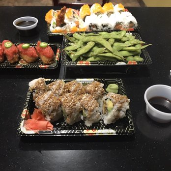 Sushi Express - Three Peat (top), Crispy Rice Spicy Tuna (middle left), Edamame (middle right), Eel & Cali Roll (bottom) - Japanese Near Me - Miami Beach, Florida Sushi Express - Three Peat (top), Crispy Rice Spicy Tuna (middle left), Edamame (middle right), Eel & Cali Roll (bottom) - Japanese Near Me - Miami Beach, Florida