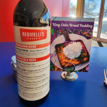 Reginelli's Pizzeria - Wine menu on wine bottles on the tables. Brilliant! - Pizza Near Me - Metairie, Louisiana Reginelli's Pizzeria - Wine menu on wine bottles on the tables. Brilliant! - Pizza Near Me - Metairie, Louisiana