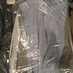 Individually laid out in garment bags and hangers like they're supposed to.