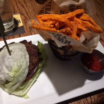 Bricktown Brewery - The burger with lettuce bun and sweet potato fries. Burger was good! They need work in their lettuce bun though. - American Near Me - Tulsa, Oklahoma