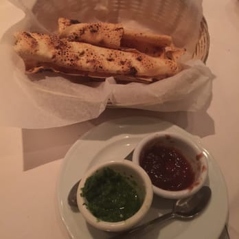 Nirvana Indian Restaurant - Appetizer that comes with every meal @ dinner. 2 dipping sauces- mint cilantro chutney/onion chutney? - Indian Near Me - Houston, Texas