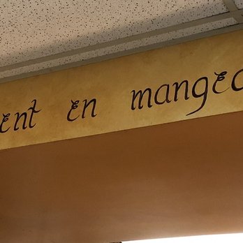 The Pantry - a sign on the wall of a restaurant - Grocery Near Me - Fairfield, Connecticut