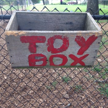 South Bend Dog Park - A box for abandoned toys, near the park bench at the top of the hill - Dog Parks Near Me - Atlanta, Georgia