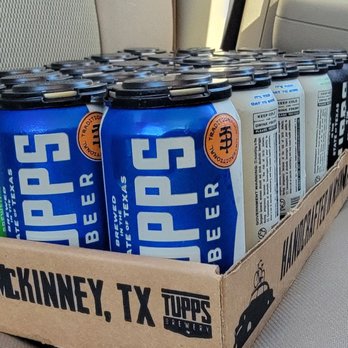 TUPPS Brewery - six cans of beer in a cardboard box - Breweries Near Me - McKinney, Texas TUPPS Brewery - six cans of beer in a cardboard box - Breweries Near Me - McKinney, Texas