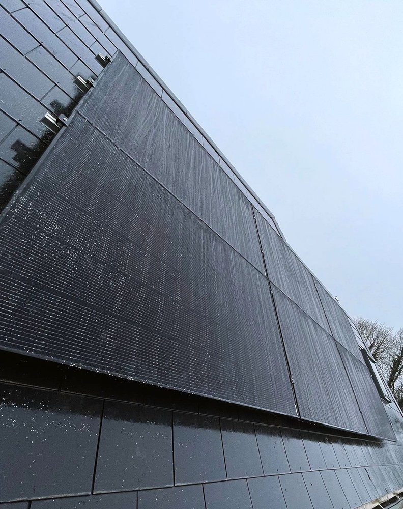 Slide of Tobin Hill Roofing