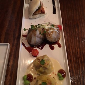 Lucky Belly - Sampler: lobster shumai, ox tail dim sum, and pork bao. - Bars Near Me - Honolulu, Hawaii Lucky Belly - Sampler: lobster shumai, ox tail dim sum, and pork bao. - Bars Near Me - Honolulu, Hawaii