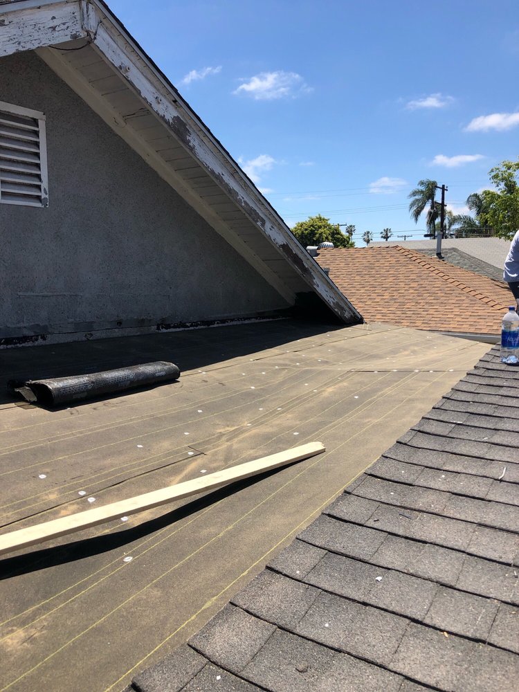 Slide of Kennedy Roofing