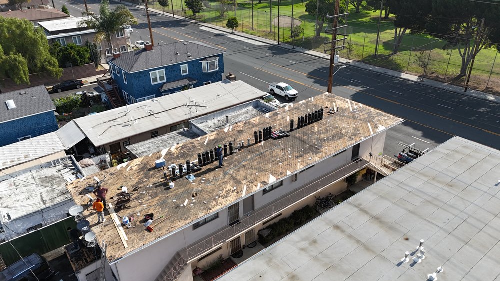 Slide of Meza Roofing Systems