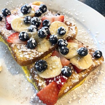 Nan's Cafe - a plate of french toast topped with strawberries, bananas, and blueberries - Breakfast & Brunch Near Me - North Reading, Massachusetts Nan's Cafe - a plate of french toast topped with strawberries, bananas, and blueberries - Breakfast & Brunch Near Me - North Reading, Massachusetts
