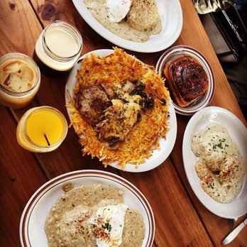 Pine State Biscuits - Hash browns, two iced coffees and a mimosa, a cinnamon roll and biscuits and gravy! - Southern Near Me - Portland, Oregon Pine State Biscuits - Hash browns, two iced coffees and a mimosa, a cinnamon roll and biscuits and gravy! - Southern Near Me - Portland, Oregon