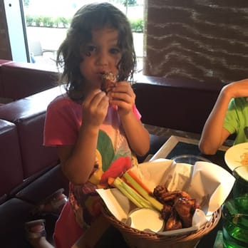 Potrefená Husa - Chicken wings and fries. Her favorites :) - Czech Near Me - Prague, Puerto Rico