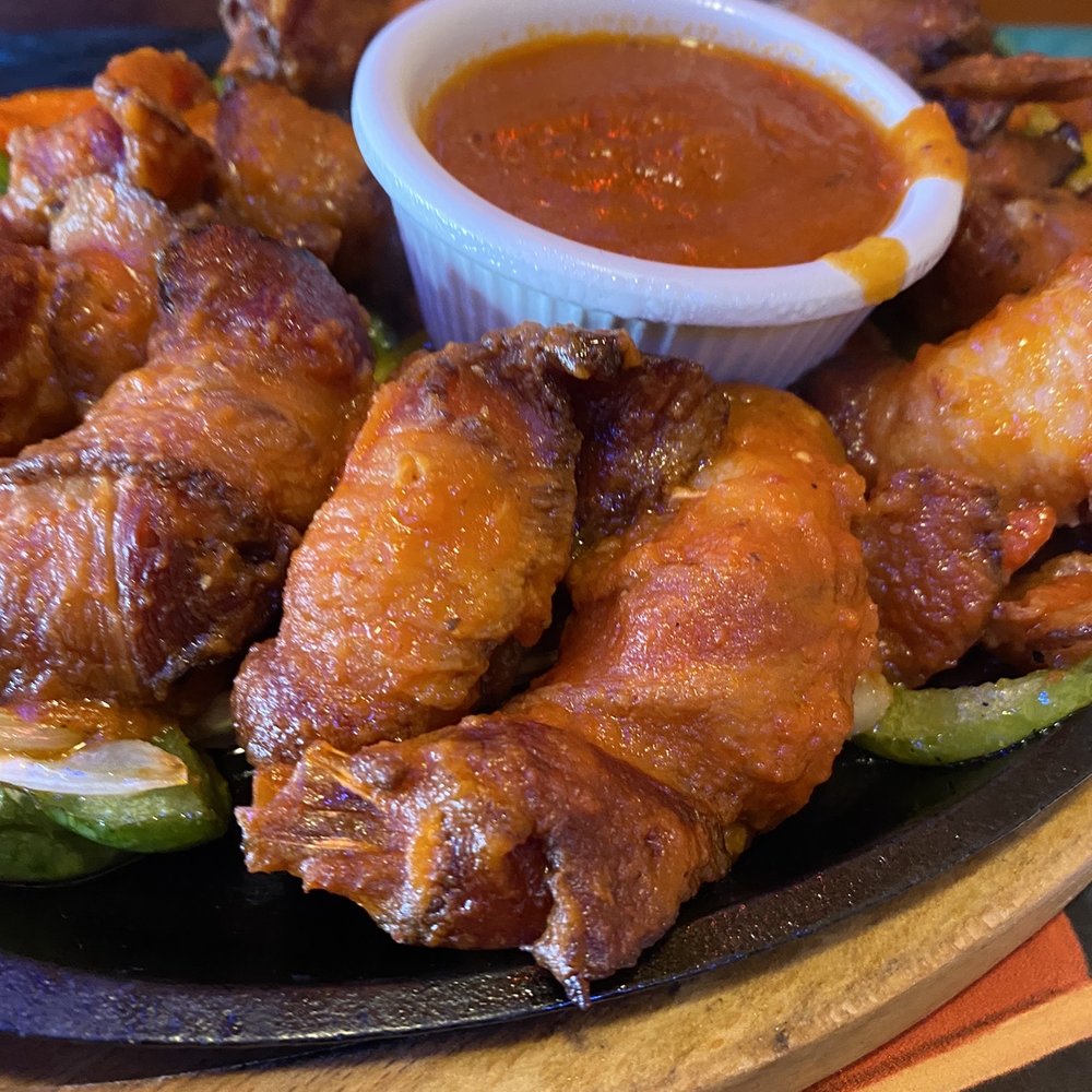 Mi Ranchito Grill - Camarones Imperiales 10 jumbo shrimp wrapped with bacon, pan-fried. Comes with a zesty dipping sauce, rice/beans,flour tortillas. 23.99 - Mexican Near Me - Salt Lake City, Utah Mi Ranchito Grill - Camarones Imperiales 10 jumbo shrimp wrapped with bacon, pan-fried. Comes with a zesty dipping sauce, rice/beans,flour tortillas. 23.99 - Mexican Near Me - Salt Lake City, Utah