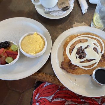 Station 400 - Cinnamon bun pancake, grits, and fruit - American Near Me - Sarasota, Florida Station 400 - Cinnamon bun pancake, grits, and fruit - American Near Me - Sarasota, Florida