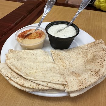 Fiesta Grill Persian - Pita and hummus. Hummus kinda watery. Garlic sauce needs more bite. - Persian/Iranian Near Me - Torrance, California Fiesta Grill Persian - Pita and hummus. Hummus kinda watery. Garlic sauce needs more bite. - Persian/Iranian Near Me - Torrance, California