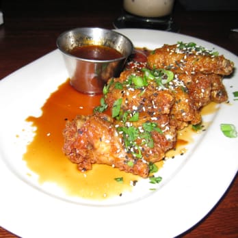 Houlihan's - Chicken wings w/Thai chile glazed sesame ginger sauce - Bars Near Me - Hernden, Virginia Houlihan's - Chicken wings w/Thai chile glazed sesame ginger sauce - Bars Near Me - Hernden, Virginia