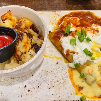 First Watch - Barbacoa quesadilla Benedict with side potatoes - Breakfast & Brunch Near Me - Winston-Salem, North Carolina