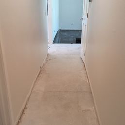 Sanding the hallway before the installation. Sanding the hallway before the installation.