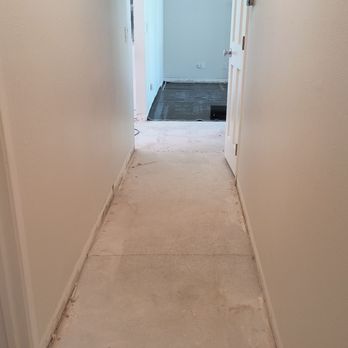 Humberto's Flooring - Sanding the hallway before the installation. - Flooring Near Me Humberto's Flooring - Sanding the hallway before the installation. - Flooring Near Me