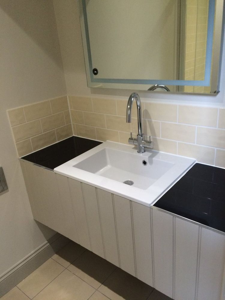 Slide of West Broadway Plumbing Company