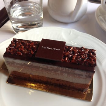 Jean-Paul Hévin - Tonka! Forgot to take off the plastic for the photo, but the cake was delicious, one of best desserts I had in Paris - Chocolatiers & Shops Near Me - Paris, 75 Jean-Paul Hévin - Tonka! Forgot to take off the plastic for the photo, but the cake was delicious, one of best desserts I had in Paris - Chocolatiers & Shops Near Me - Paris, 75