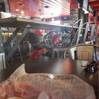 Crossroads - a view of a cafe with a red motorcycle parked in the background - Pizza Near Me - Jacksontown, Ohio