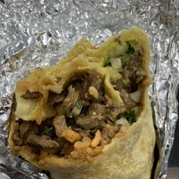 Carne asada burrito. Look at all that meat. Big protein. Carne asada burrito. Look at all that meat. Big protein.