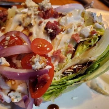 Outback Steakhouse - Wedge salad with blue cheese dressing and balsamic drizzle. - Steakhouses Near Me - Kissimmee, Florida