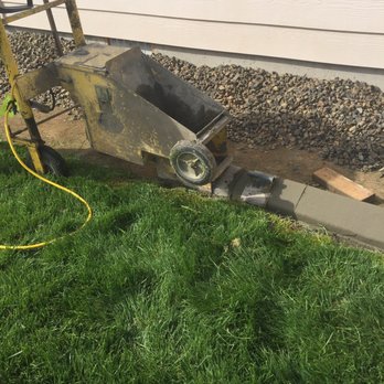 Curbing Guy - The machine making the curb - Landscaping Near Me