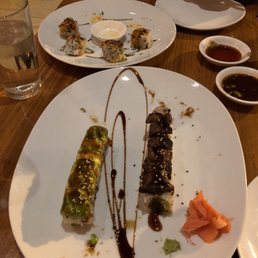 Flanking maki, Kobe, and unagi role before I ate most of it Flanking maki, Kobe, and unagi role before I ate most of it