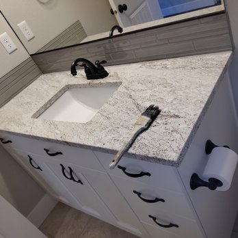 Eddy's NW Remodeling - Bathroom remodeling: vanity, counter top, faucet and backsplash new. - General Contractors Near Me