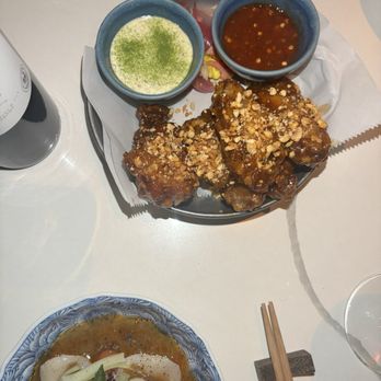 Kingfisher - CRISPY CHICKEN WINGS Tamarind Glaze, Crispy Garlic, Peanuts, House Pickles, Toasted Coconut Ranch, Hot Sauce. - Vietnamese Near Me - San Diego, California Kingfisher - CRISPY CHICKEN WINGS Tamarind Glaze, Crispy Garlic, Peanuts, House Pickles, Toasted Coconut Ranch, Hot Sauce. - Vietnamese Near Me - San Diego, California